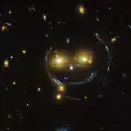 Хъбъл засне феноменалната усмивка на Вселената